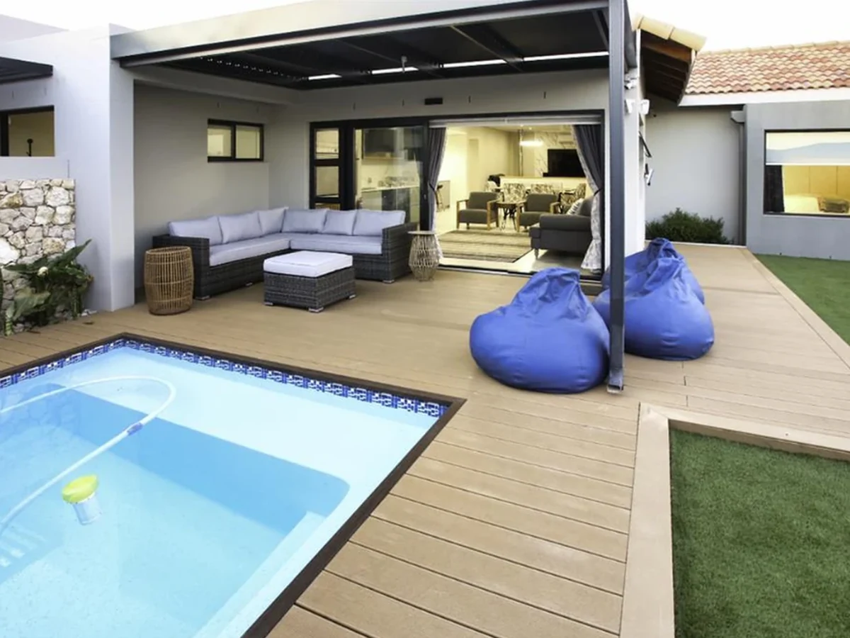 Langebaan holiday accommodation with a swimming pool, deck and outdoor living area