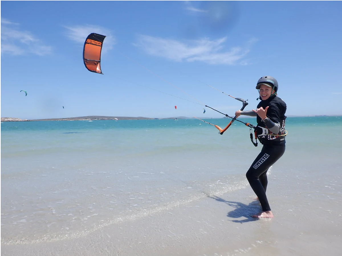 Kitesurfer with kite equipment beside the Langebaan lagoon